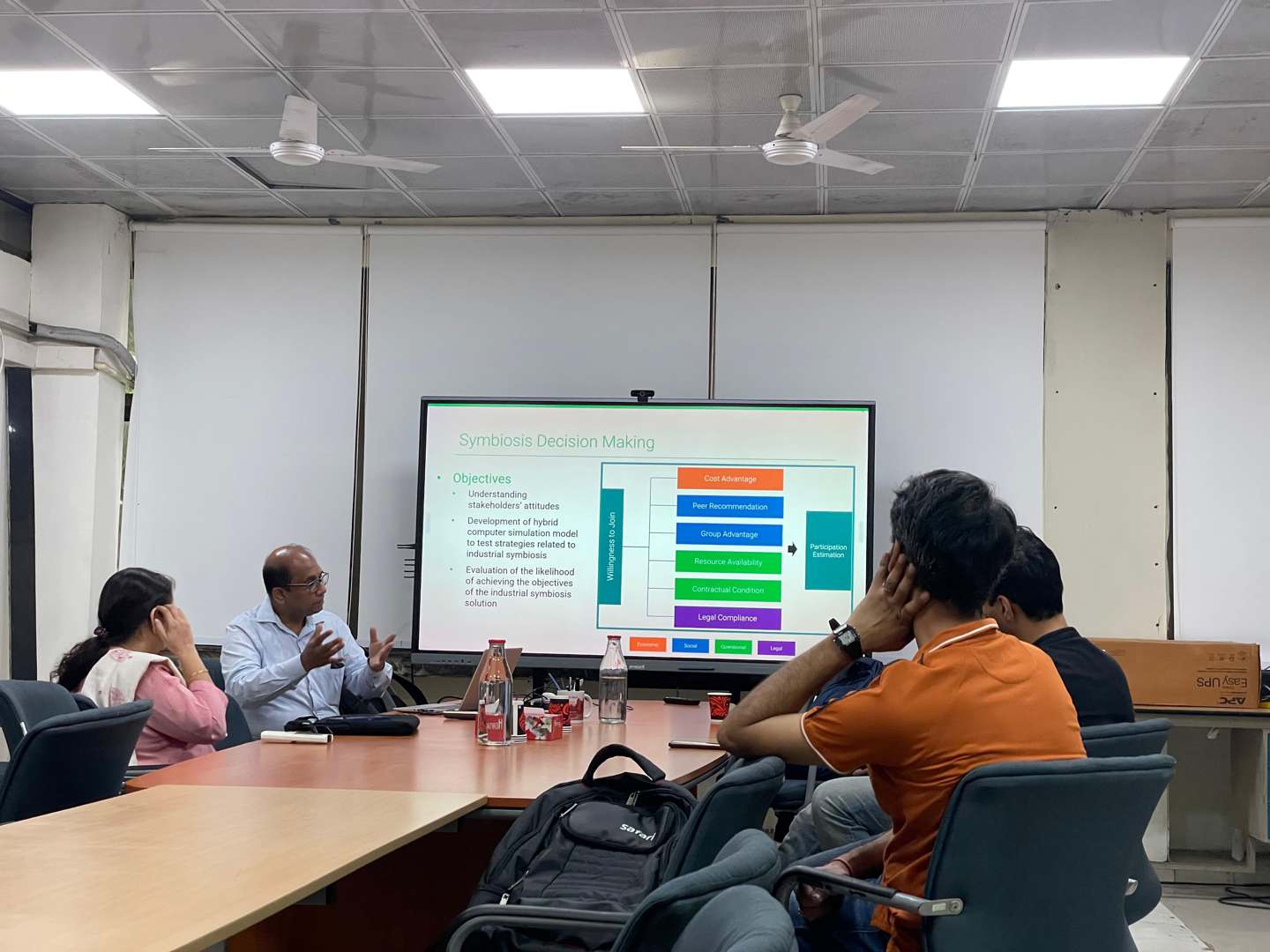 Dr. Boli Chen discussing his research with attendees